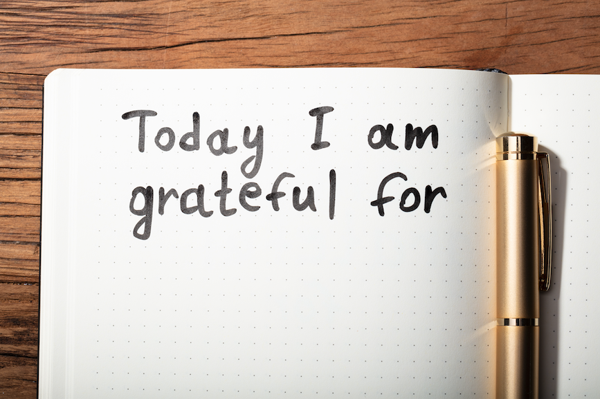 A journal reads, "Today I am grateful for..."
Gratitude is another tool that can help you relax at work.