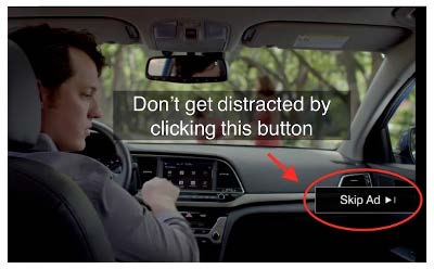 Example of a YouTube skippable advertisement showcasing a man driving a car, positioned to be looking at the 'Skip Ad' prompt in lower right corner. 